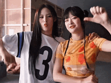 a girl with the number 3 on her shirt