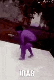 a man in a purple suit is squatting on a white surface with the word dab written on the bottom