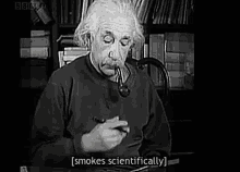 Smokes Scientifically Einstein GIF - Smokes Scientifically Einstein Smart GIFs