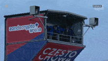 a building with a sign that says zondacrypto arena