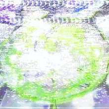 a blurry picture of a green object with a purple border