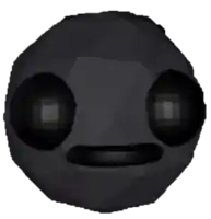 a black ball with two black eyes and a mouth
