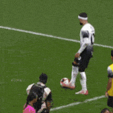 a soccer player with the number 10 on his back kicks the ball