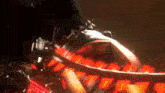 a close up of a person riding a roller coaster at night