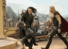 loki and thor are fighting each other in a scene from the movie .