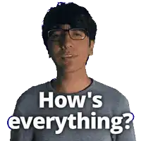 a man with glasses says how 's everything in front of his face