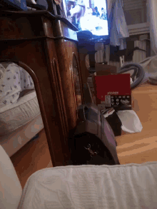 a box that says ' g-shock ' on it sits on a desk