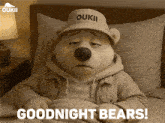 a teddy bear is laying in bed with the words goodnight bears on the bottom