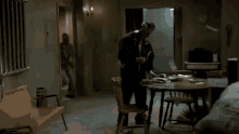 Paulie Walnuts Counter Attack GIF - Paulie Walnuts Counter Attack Knife GIFs