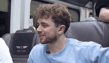 a man sits in a first class seat