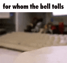 a blurred image of a person laying on a bed with the words `` for whom the bell tolls '' above them .