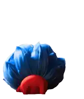 a cartoon character with blue hair wearing a red scarf