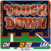a banner that says touch down on it in orange