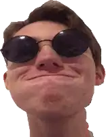 a man wearing sunglasses makes a funny face with his mouth open