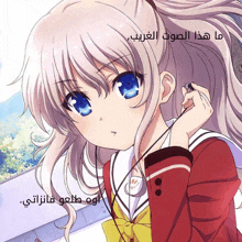 a girl with blonde hair and blue eyes is holding a pair of headphones
