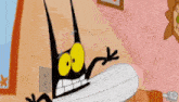 a cartoon spider with big yellow eyes is laying on a bed .