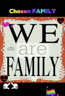 a sign that says we are family with a rainbow flag