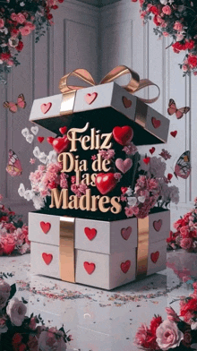 a gift box with the words feliz dia de las madres on the top