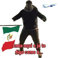 a man is dancing in front of a flag with the words anda aqui e ja te digo como e..