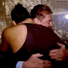 Vince Mc Mahon Roman Reigns GIF - Vince Mc Mahon Roman Reigns Hug GIFs