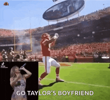 a football player is jumping in the air while a woman sings in front of a crowd .