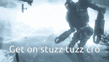 a picture of a robot with the words get on stuzz tuzz cro on the bottom