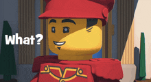 a lego man with a red hat is smiling and asking what