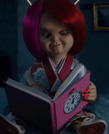 a doll with red hair is reading a book with a clock on it and the caption clock that tea