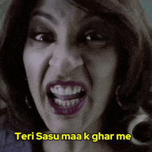 a woman with her mouth open and the words teri sasu maa k ghar me