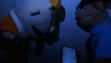 two stuffed animals are looking at a cell phone that says ' a ' on it