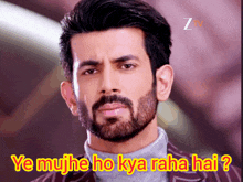a man with a beard and the words ye mujh ho kya raha hai on his face