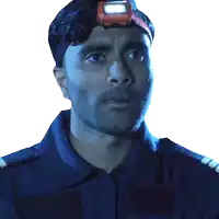 a man wearing a headband with a light on top of it