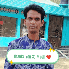 a man in a blue shirt stands in front of a blue building with a speech bubble that reads " thanks you so much "