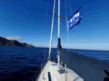trump flag boat sea ocean