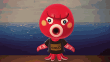 a red octopus wearing a black shirt that says gold on it