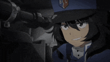 a girl wearing a blue hat with the letter b on it
