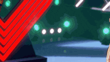 a couple of people are standing next to each other in front of a stage .