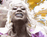 a woman with blue braces on her teeth is smiling