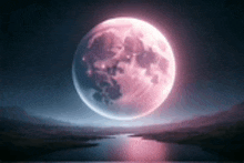 a pink full moon is rising over a river in the night sky .
