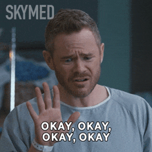 a man in a hospital gown says " okay okay okay okay "