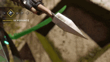 a person holding a spear with the word severance on the bottom right