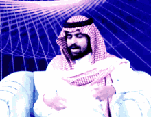 a man with a beard is wearing a head scarf