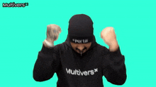 a man wearing a black hoodie that says multiverse on it