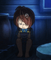 a cartoon character is sitting in a dark room holding a cellphone