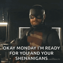 a man in a superhero suit says okay monday i 'm ready for you and your shenanigans