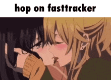 a couple of anime girls kissing with the words `` hop on fasttracker '' above them .