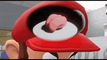 a cartoon character wearing a red hat with a tongue sticking out of it