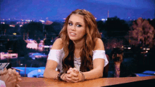 Miley Cyrus GIF - Miley Cyrus Forced Laugh Embarrassed GIFs