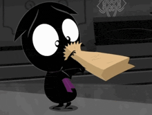 a black and white cartoon character is holding a piece of paper in its mouth