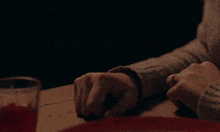 a close up of a person 's wrist with a watch on it